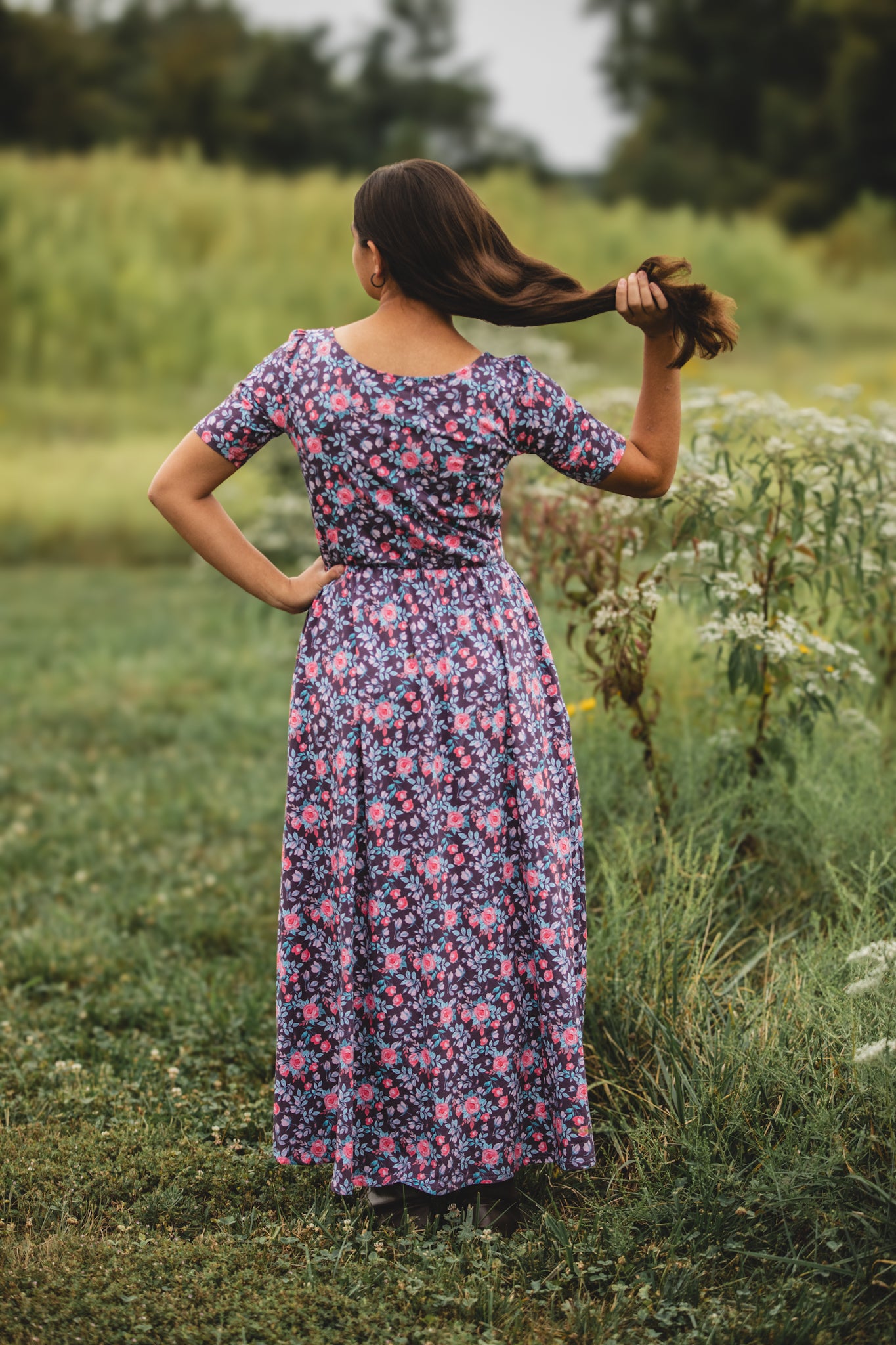 woman wearing a modest nursing floral dress