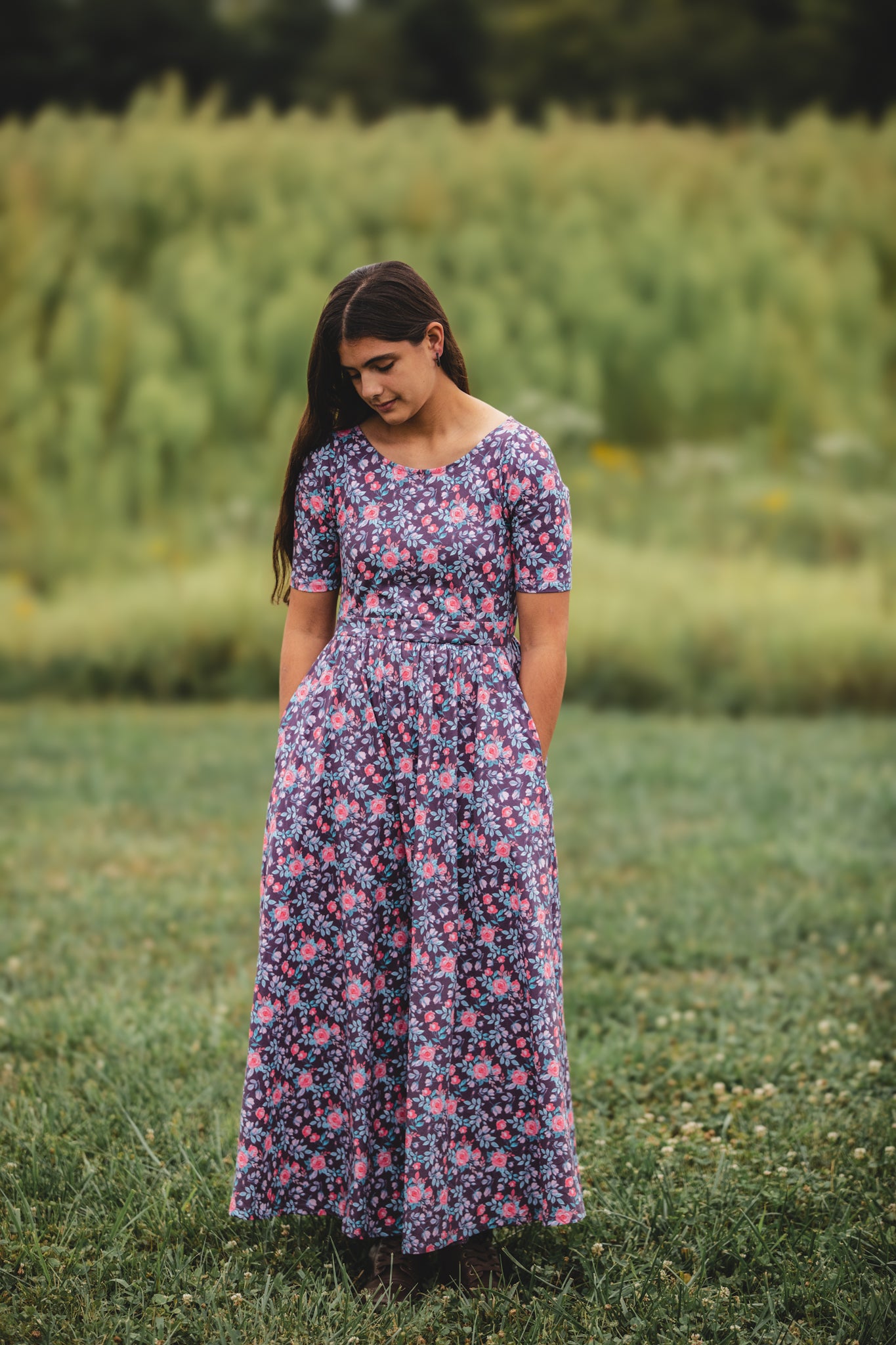 woman wearing a modest nursing floral dress
