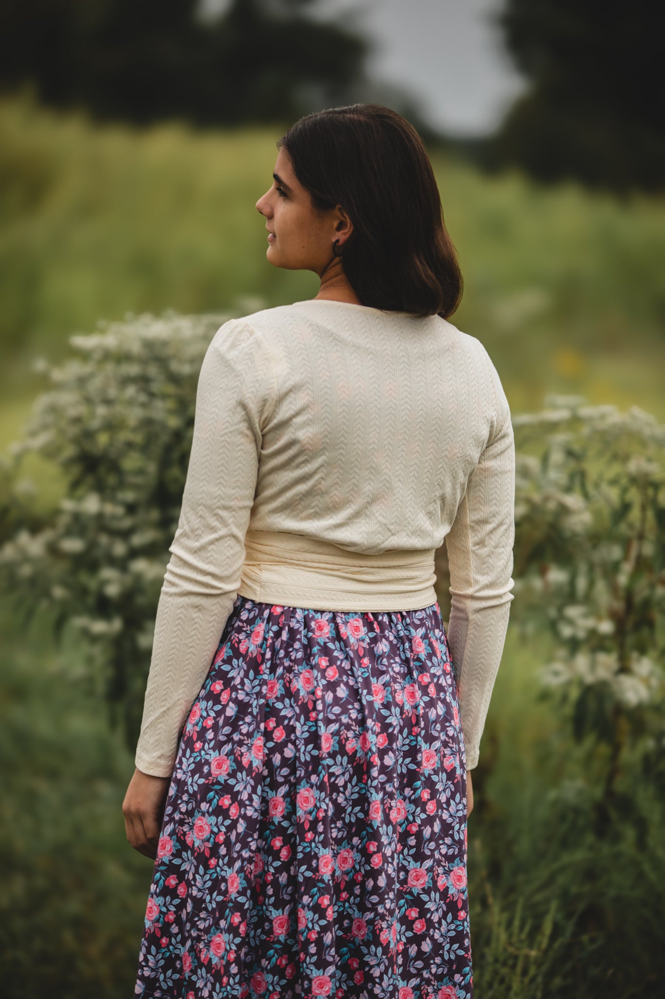 woman wearing a modest nursing floral dress