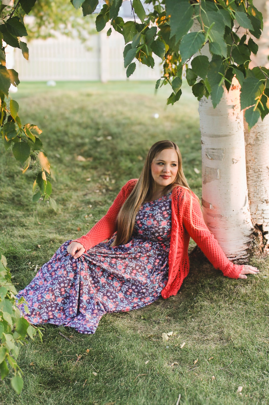 woman wearing a modest nursing floral dress