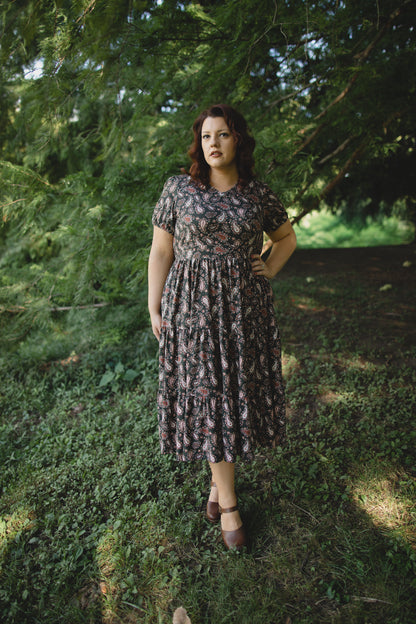 woman wearing a modest nursing floral dress