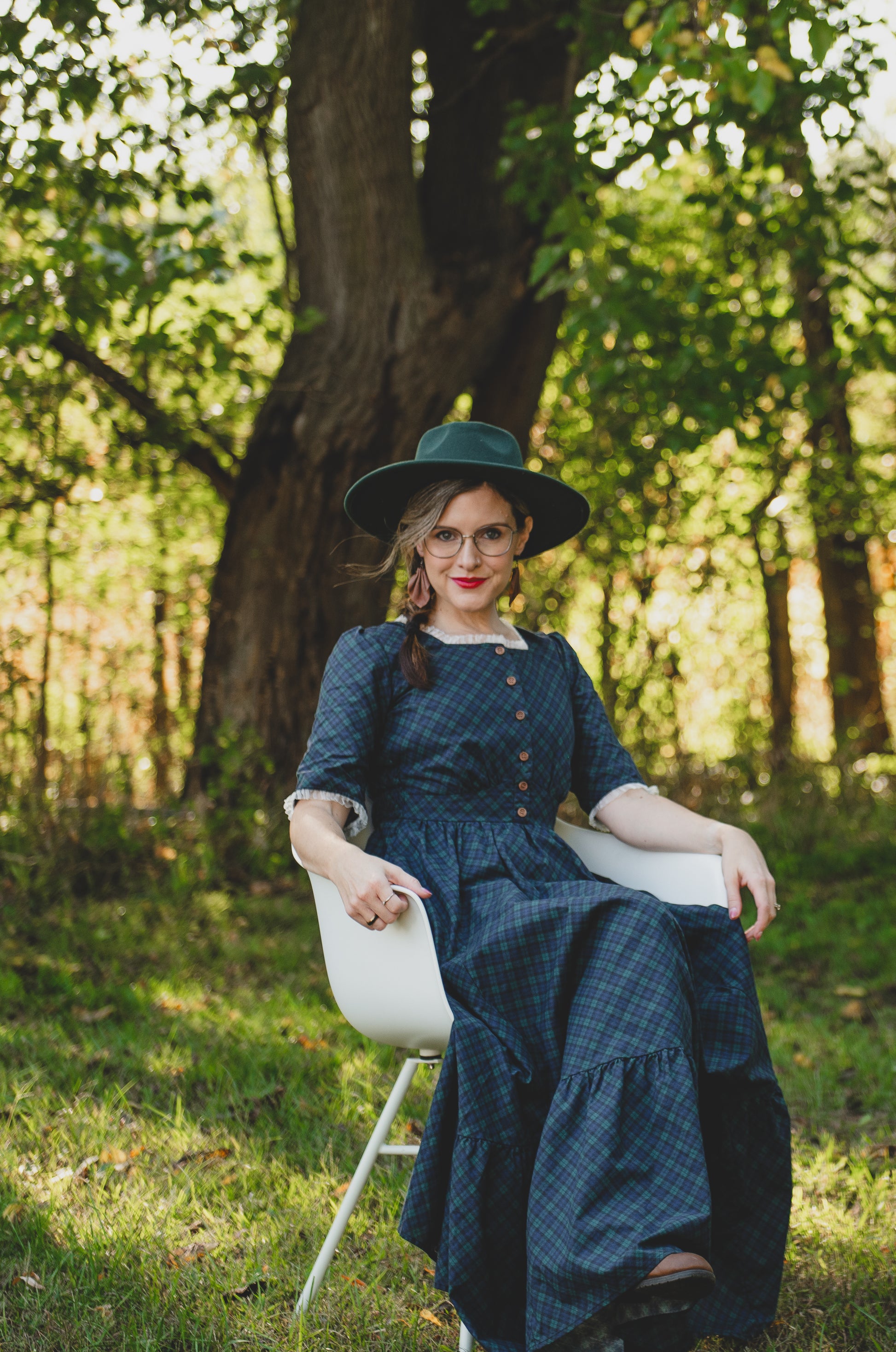 woman wearing a modest nursing blue patterned dress