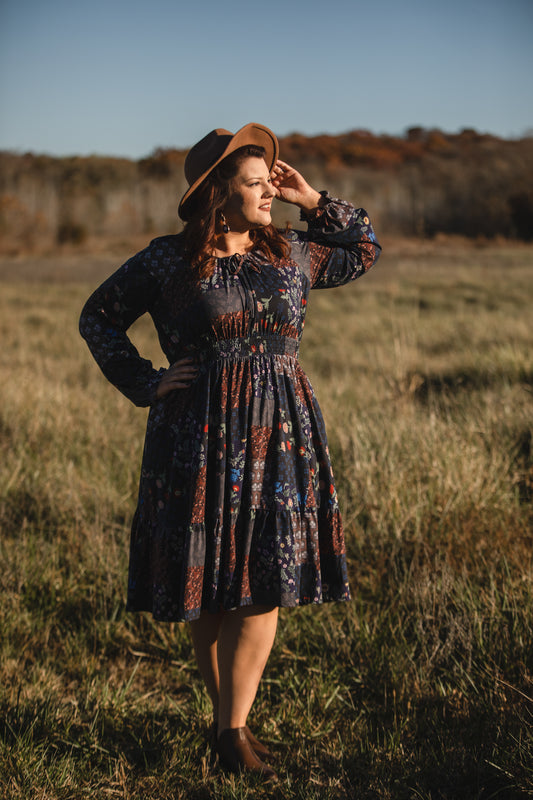 woman wearing a modest nursing floral dress