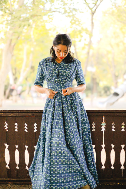 Woman in modest nursing dress outdoors