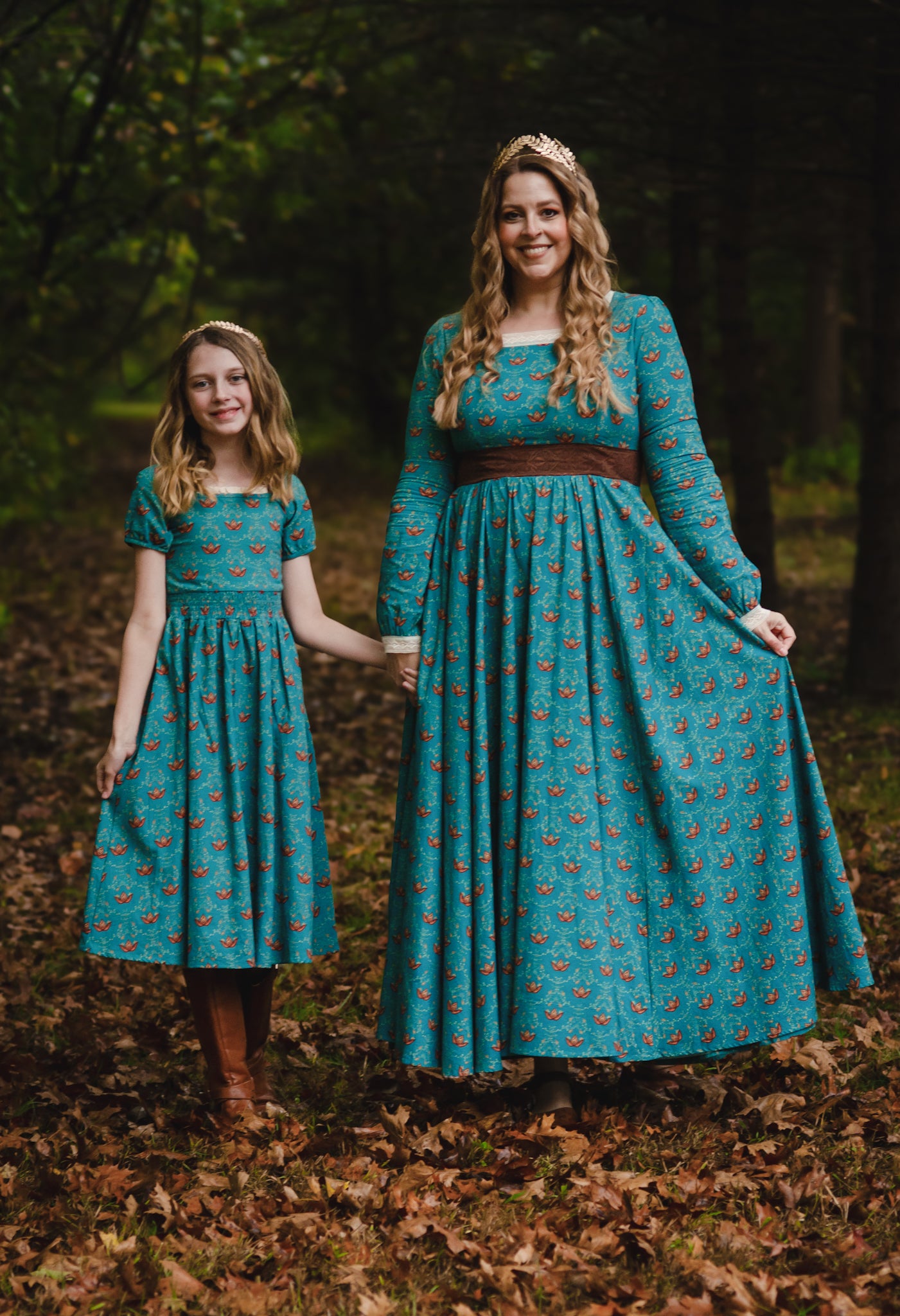 Two women in modest nursing teal floral dresses