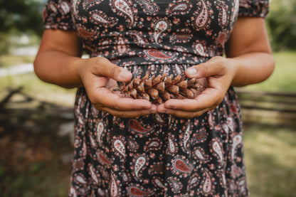 woman wearing a modest nursing floral dress