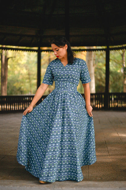 Woman in modest nursing dress in park