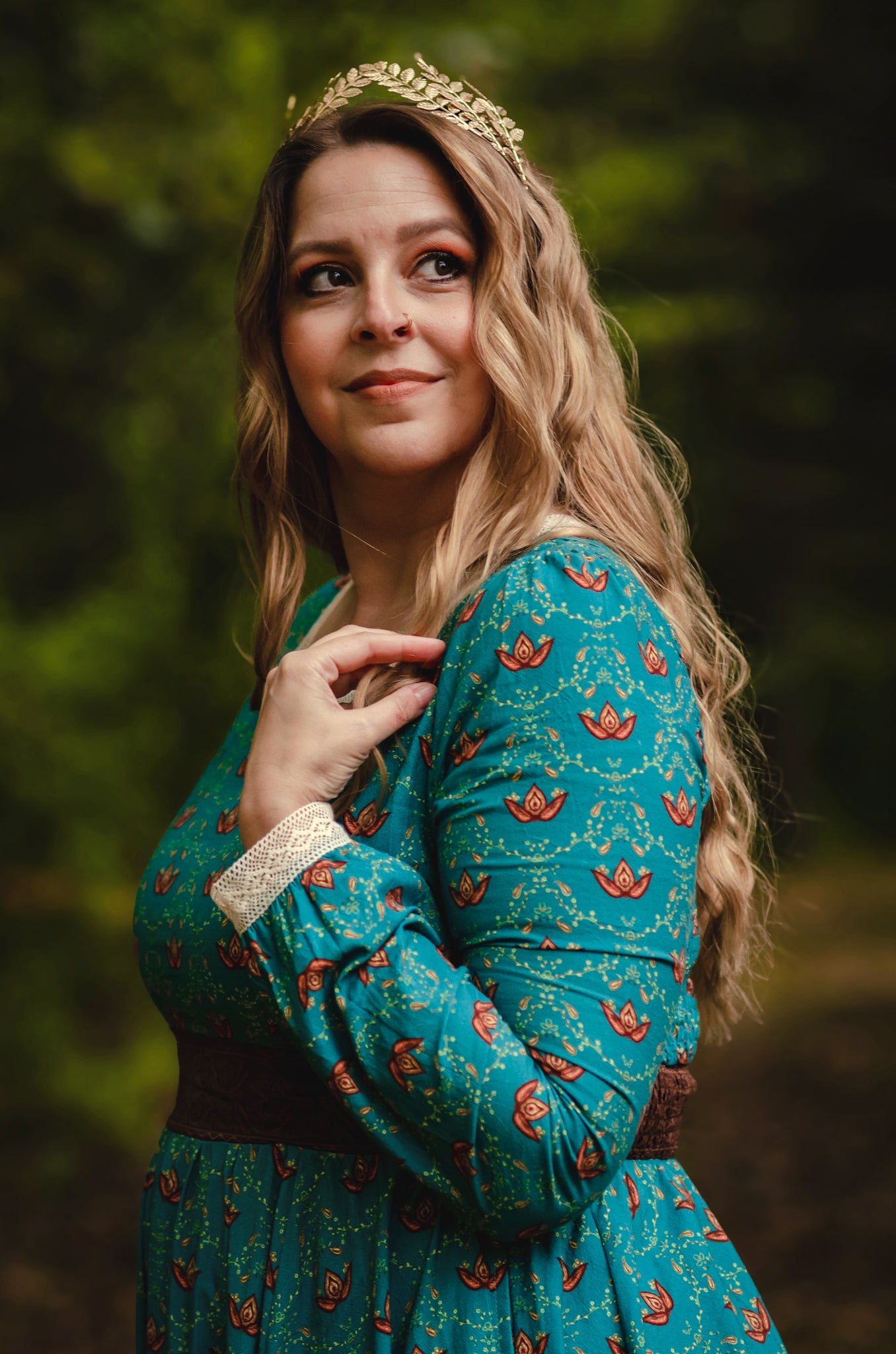 Woman in modest nursing teal floral dress outdoors