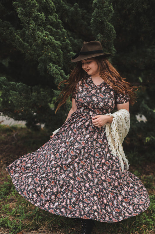 woman wearing a modest nursing floral dress