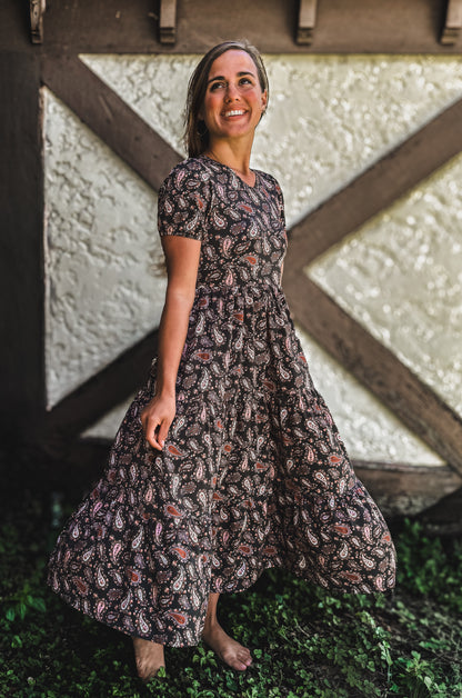 woman wearing a modest nursing floral dress
