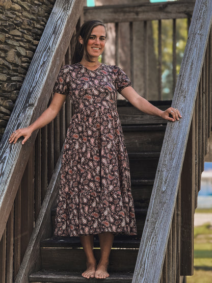 woman wearing a modest nursing floral dress