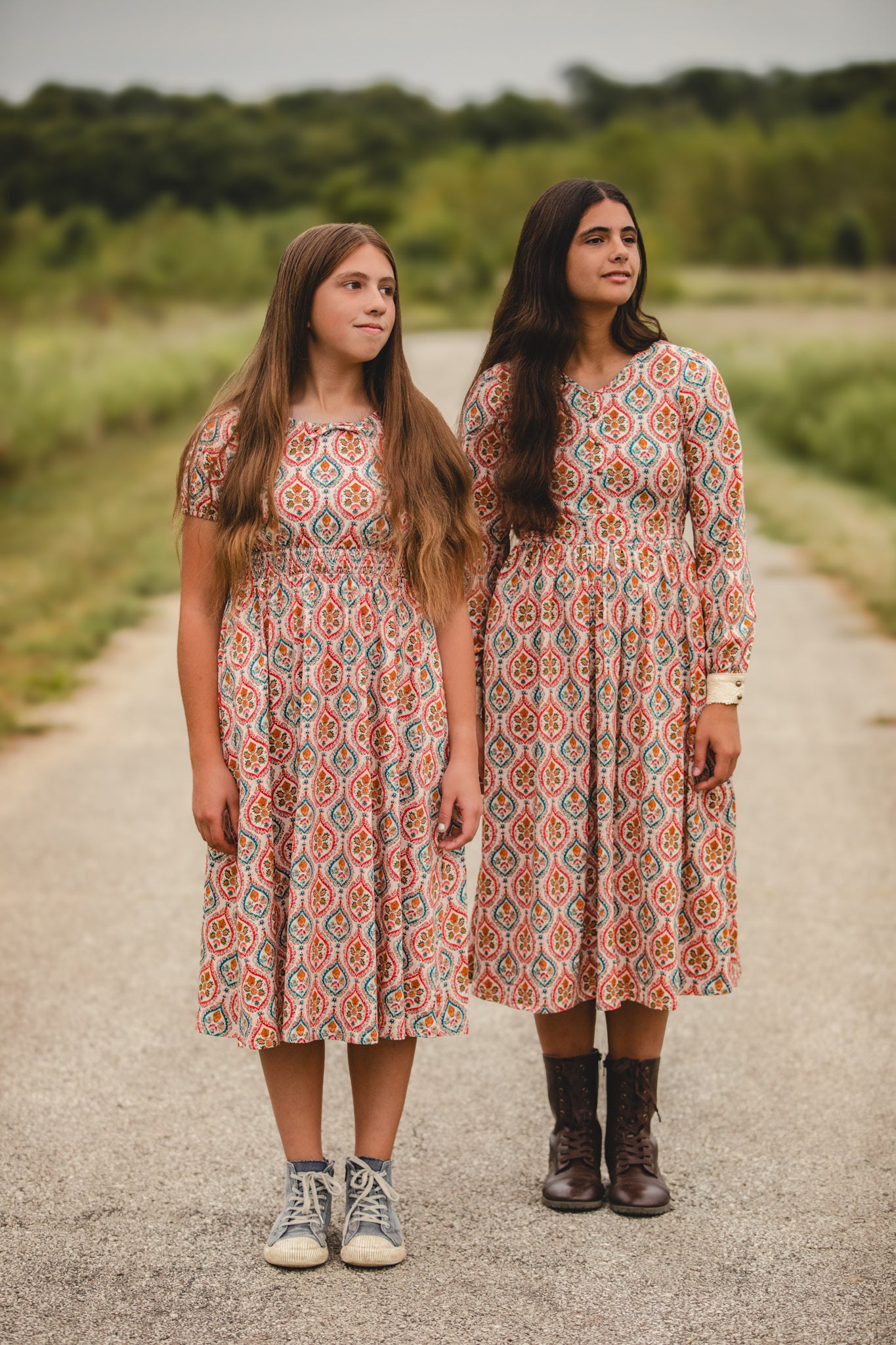 Women wearing patterned modest nursing dresses