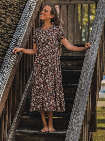 woman wearing a modest nursing floral dress