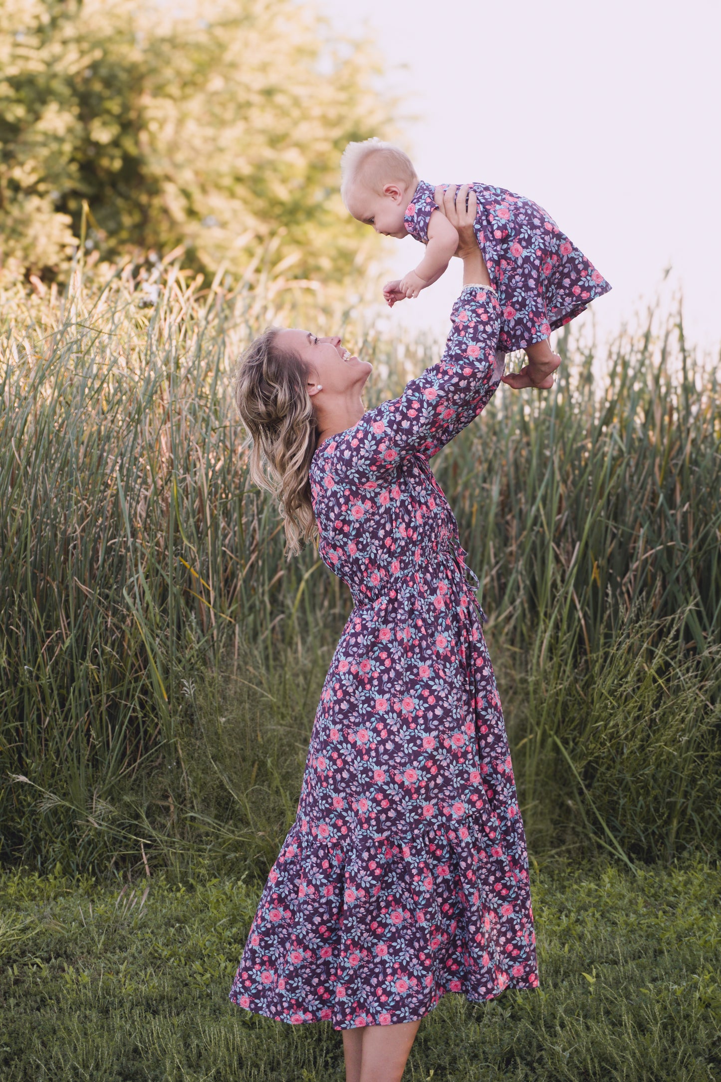 Woman in modest nursing floral dress outdoors