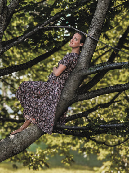 woman wearing a modest nursing floral dress