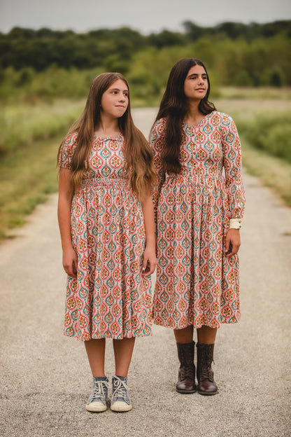 Women in modest nursing dresses on road