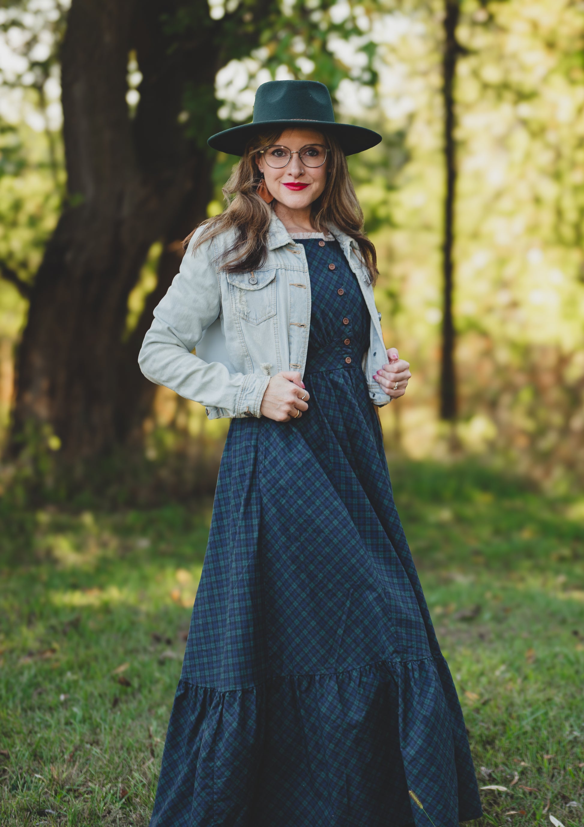 woman wearing a modest nursing blue patterned dress