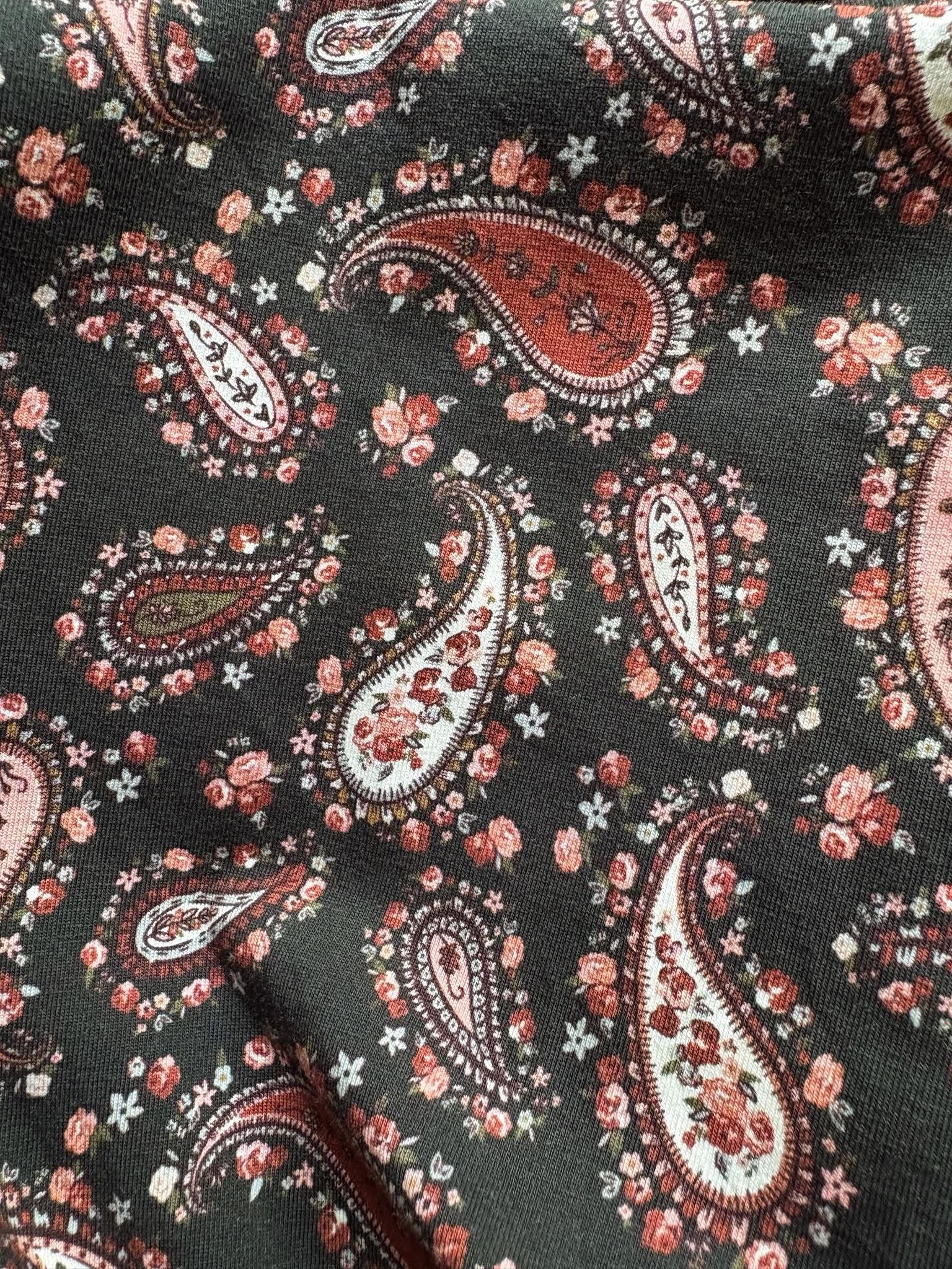 woman wearing a modest nursing floral dress