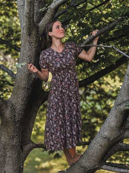 woman wearing a modest nursing floral dress
