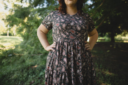 woman wearing a modest nursing floral dress