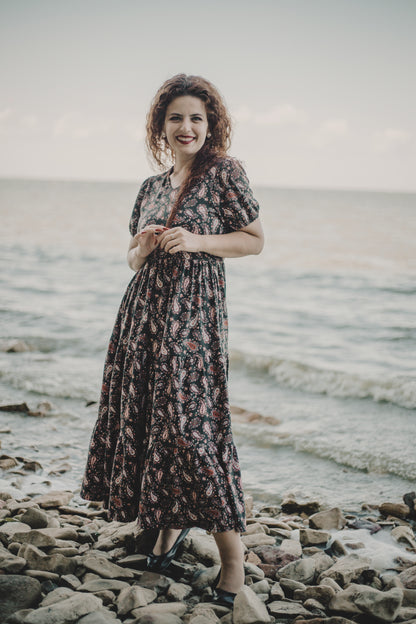 woman wearing a modest nursing floral dress