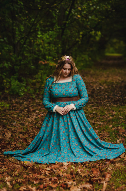 Woman in modest nursing blue floral dress