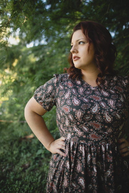 woman wearing a modest nursing floral dress