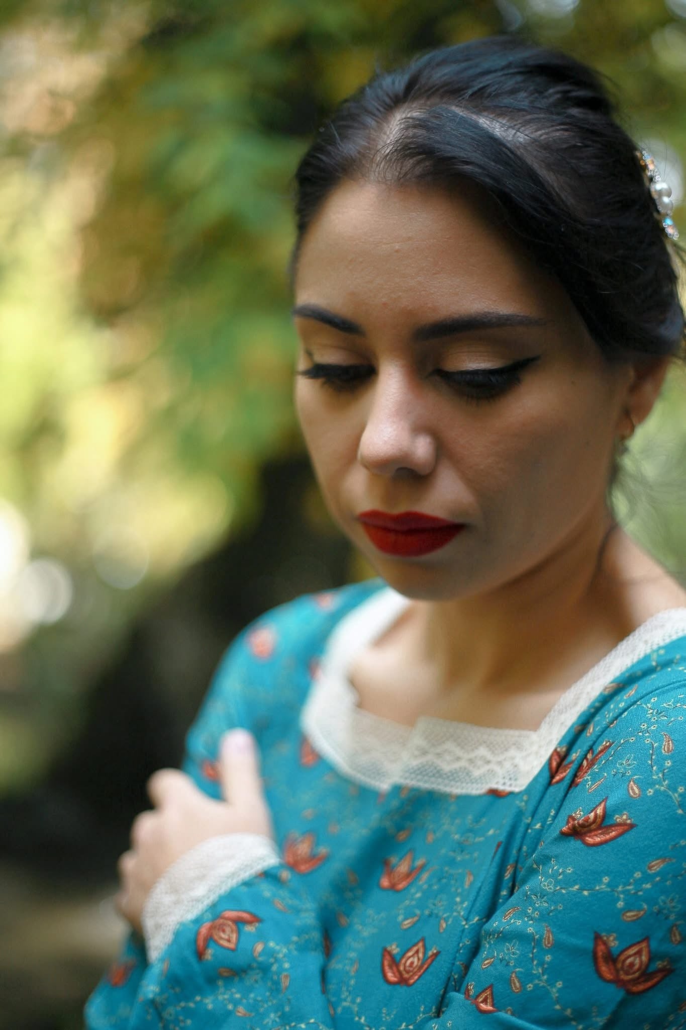 Woman in modest nursing blue traditional dress