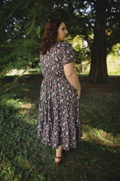 woman wearing a modest nursing floral dress