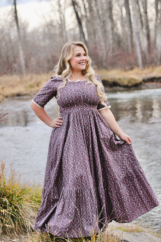 woman wearing a modest nursing dress