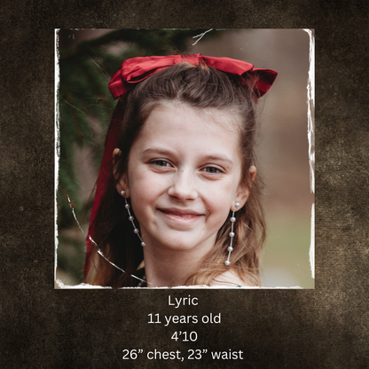Young girl with a red bow in her hair on a textured brown background