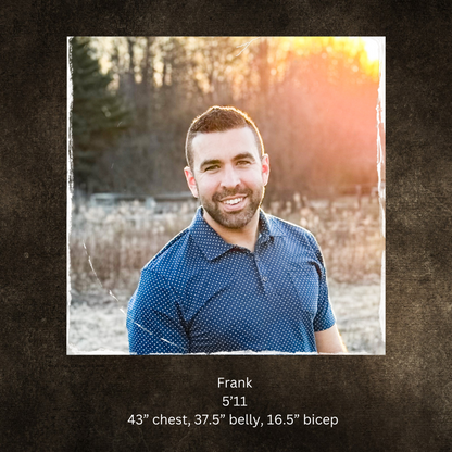 Man in blue polo outdoors with sunlight.