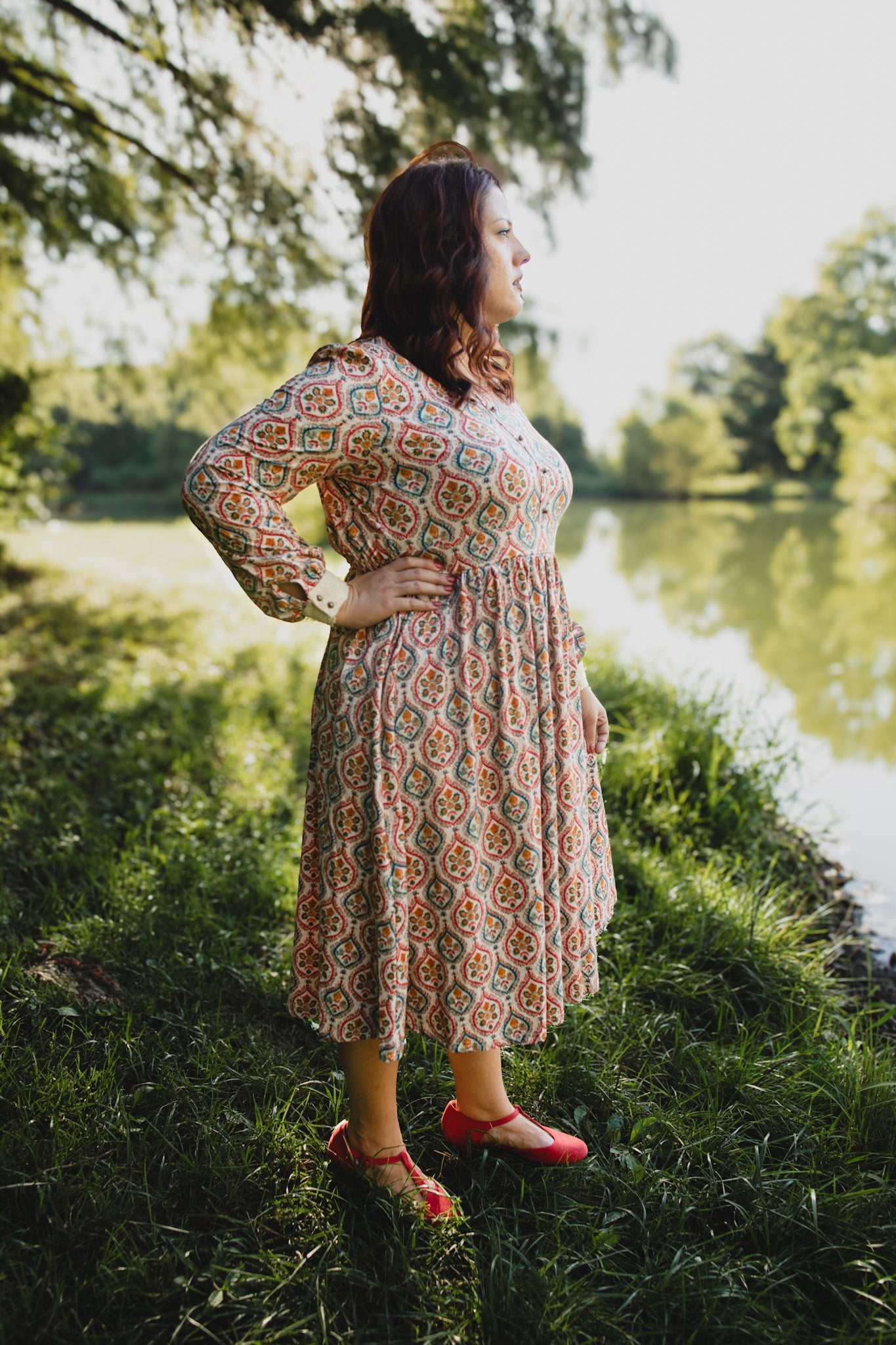 Woman wearing a patterned modest nursing dress