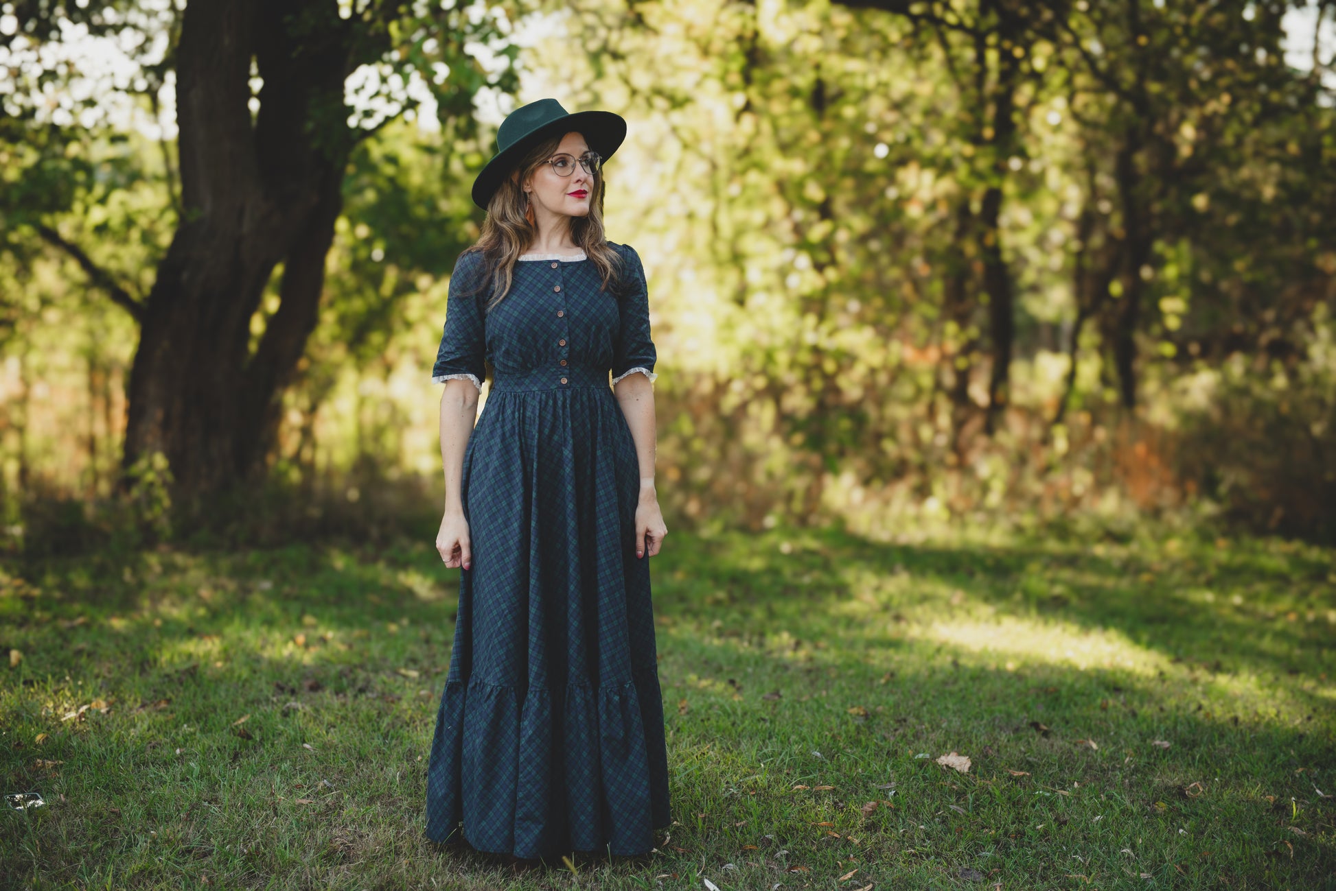 woman wearing a modest nursing blue patterned dress